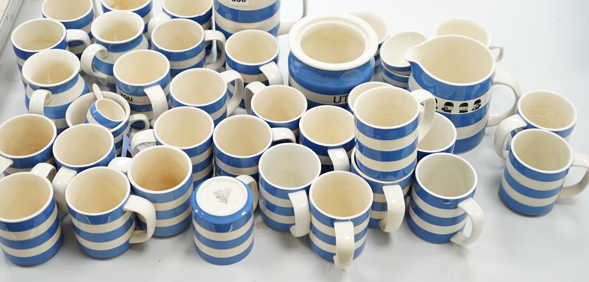 T.G.Green Cornish Kitchenware, a large collection of modern tableware, mainly cups, together with assorted spare covers, jugs, etc. Condition - poor, fair and good